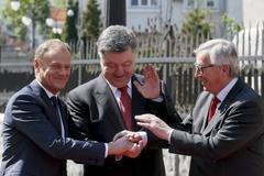 Donal Tusk, Petro Porošenko a Jean-Claude Juncker