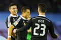 Real Madrid's James celebrates his goal against Celta Vigo with teammates Chicharito and Isco during their Spanish first division soccer match at Balaidos stadium in Vigo