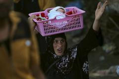 Obyvatelé prchající před IS z iráckého Ramadi