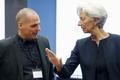 Greek Finance Minister Varoufakis listens to IMF Managing Director Lagarde during an euro zone finance ministers meeting in Luxembourg