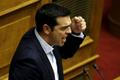 Alexis Tsipras při projevu v parlamentu.