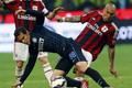 AC Milan's De Jong challenges Inter Milan's Hernanes during their Serie A soccer match at the San Siro stadium in Milan
