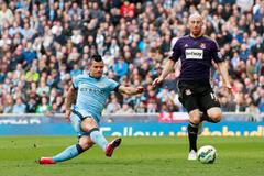 Football: Sergio Aguero scores the second goal for Manchester City