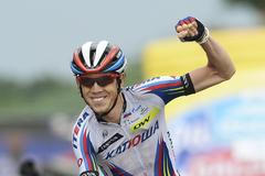Team Katusha rider Zakarin of Russia celebrates after winning the 153 km eleven stage of the 98th Giro d'Italia cycling race from Forli to Imola