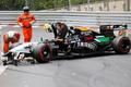 Force India Formula One driver Sergio Perez leaves his car after crashing at the start of the Monaco F1 Grand Prix in Monaco