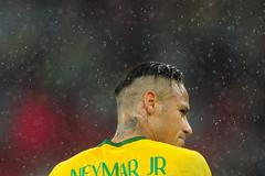 Brazil's Neymar looks on during their friendly soccer match against Honduras in Porto Alegre