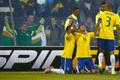Brazil's Silva celebrates with teammates Robinho and Miranda after scoring a goal against Venezuela during their first round Copa America 2015 soccer match at Estadio Monumental David Arellano in Sant