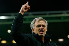 Football: Chelsea manager Jose Mourinho celebrates at the end of the match
