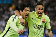 Football: Luis Suarez (L) celebrates with Neymar after scoring the second goal for Barcelona