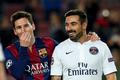 Paris St Germain's Ezequiel Lavezzi walks off the pitch with his compatriot Barcelona's Lionel Messi at the end of their Champions League Group F soccer match at the Nou Camp stadium in Barcelona