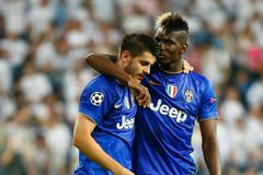 Paul Pogba a Alvaro Morata v semifinále Ligy mistrů 2015