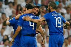 Alvaro Morata a hráči Juventusu slaví branku v semifinále LM