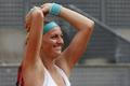 Petra Kvitova of the Czech Republic celebrates winning her final match against Svetlana  Kuznetsova of Russia at the Madrid Open tennis tournament in Madrid, Spain