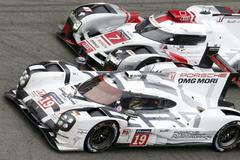 24 h Le Mans 2015: Nick Tandy, Porsche 919 Hybrid (19) a Marcel Fässler, Audi R18 e-tron quattro