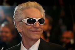 Director David Cronenberg poses on the red carpet as he arrives for the screening of the film "Maps to the Stars" in competition at the 67th Cannes Film Festival in Cannes