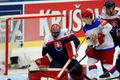 Slovakia's goaltender Hudacek defends against Russia's Shirokov during their Ice Hockey World Championship game at the CEZ arena in Ostrava
