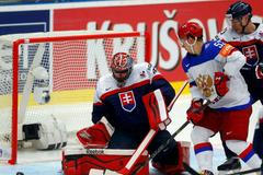 Slovakia's goaltender Hudacek defends against Russia's Shirokov during their Ice Hockey World Championship game at the CEZ arena in Ostrava
