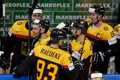 Germany's Plachta celebrates his goal against Latvia with team mates during their Ice Hockey World Championship game at the O2 arena in Prague