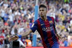 Barcelona's Neymar celebrates his goal against Real Sociedad during their Spanish first division soccer matchat Nou Camp stadium in Barcelona