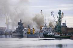 General view shows smoke rising above dock at Zvyozdochka shipyard in north Russian city of Severodvinsk