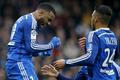 Olympique Lyon's Lacazette celebrates with team mates after scoring against Guingamp during their French Ligue 1 soccer match at the Roudourou stadium in Guingamp