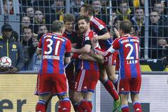 Lewandowski of Bayern Munich celebrates his goal against Borussia Dortmund during their German first division Bundesliga soccer match in Dortmund