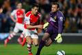 Football: Alexis Sanchez scores the third goal for Arsenal as Hull's Steve Harper looks on