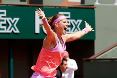 Lucie Safarova of Czech Republic celebrates after winning with Mattek-Sands of the US their women's doubles final match against Dellacqua of Australia and Shvedova of Kazakhstanat the French Open tenn