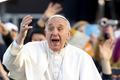 Pope Francis waves as he leaves at the end of meeting with youths at the seafront during his pastoral visit in Naples