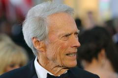 Director Clint Eastwood arrives at the 87th Academy Awards in Hollywood