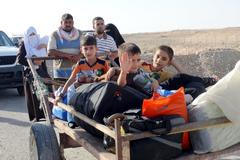 Obyvatelé prchající před IS z iráckého Ramadi