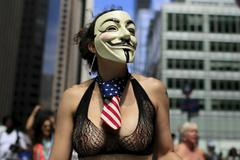A woman takes part in the topless march in New York