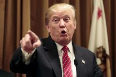 U.S. Republican presidential candidate Trump speaks during a news conference regarding issues on undocumented immigrants in Beverly Hills, California