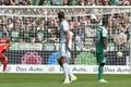 Schalke 04's Matip and Werder Bremen's Ujah react as Weder Bremen's Selassie scores an own goal during the German Bundesliga first division soccer match against Schalke 04 in Bremen