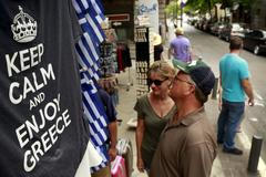 Řecko turisté T-shirts on display in a shop in Athens, Greece