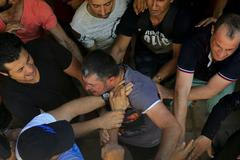 Syrští uprchlíci při registraci na Kosu.