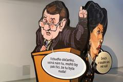 Karikatury Chodorkovského a justice. Jako z Kafkova románu