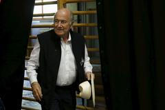 Blatter arrives for a news conference aside of the so-called "Sepp Blatter tournament" in Ulrichen