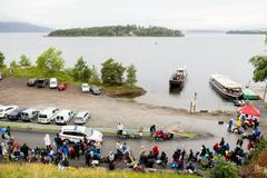 Youths stand in a line to wait for the MS Thorbjorn ferry to take them to Utoya island