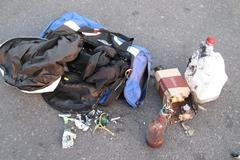 Nástražný systém a kanystr s hořlavinou