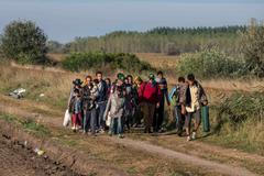 Uprchlíci opouštění maďarský tábor