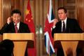 Si Ťin-pching a David Cameron