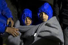 Uprchlíci u Berkasova na srbsko-chorvatské hranici.