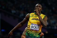 Nejlepší fotky roku 2012 od Reuters (OH Londýn, sprint na 200 metrů, Usain Bolt)