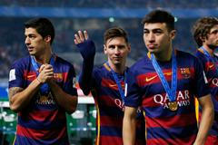 Lionel Messi a Luis Suarez po vítězství na MS klubů 2015