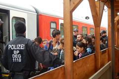 Pasov. Vlak z Rakouska se syrskými uprchlíky.