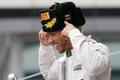 Mercedes' Hamilton celebrates winning Russian F1 Grand Prix in Sochi