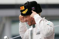 Mercedes' Hamilton celebrates winning Russian F1 Grand Prix in Sochi