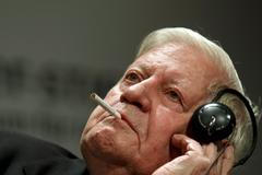 File photo shows former German Chancellor Schmidt smoking during ceremony marking 50th anniversary of Bergedorfer Forum of Koerber Foundation in Berlin