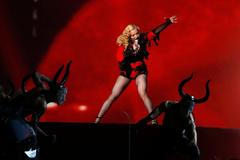 Madonna performs "Living for Love" at the 57th annual Grammy Awards in Los Angeles